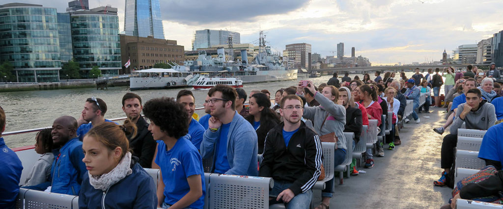 Students on a boat in London.